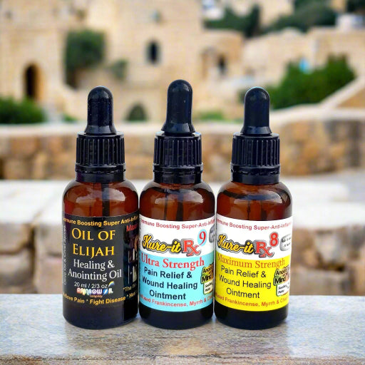 Three bottles of Kure-it anointing oil in different strengths: Oil of Elijah Ultimate Strength, Kure-it Rx9 Ultra, and Kure-it Rx8 Max Strength, with dropper caps.