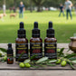 Four bottles of Good Samaritan Healing & Anointing Oil on a white background