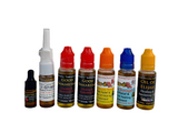 Collection of various bottles with colorful caps on a white background