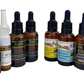 Collection of various bottles with labels on a white background